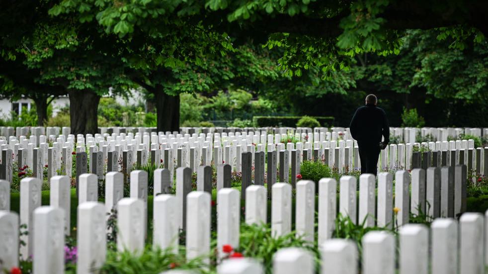 Person walking in D Day memorial cemetery